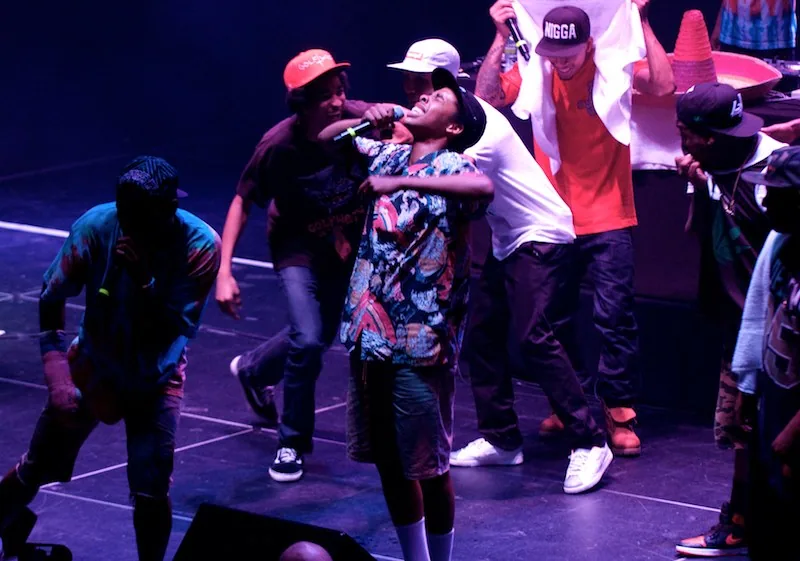 Earl Sweatshirt performing in an archival photograph; MIKE is not pictured
