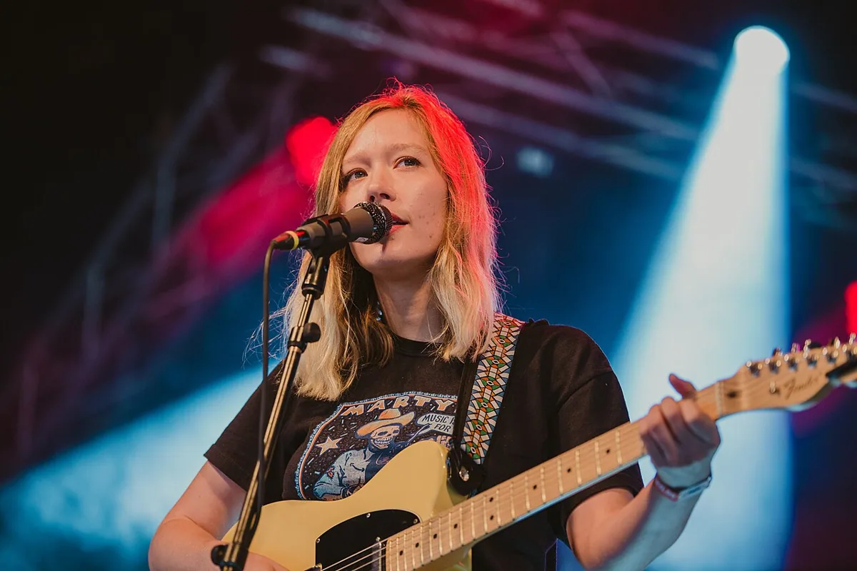 Julia Jacklin performing live in an archival photograph