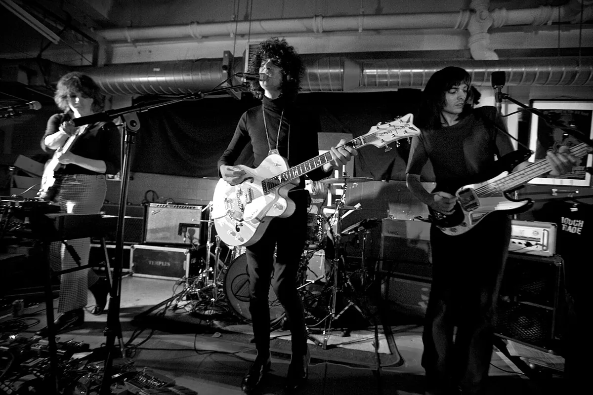 Temples performing live in an archival photograph